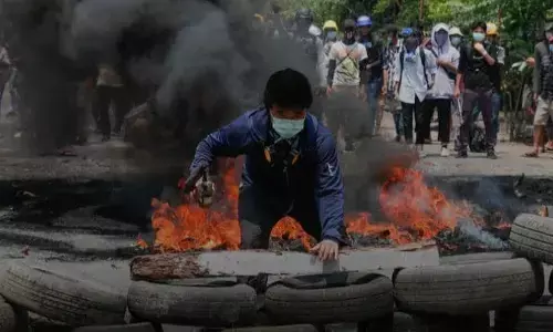 Fighting in Myanmar kills at least 15 after uprising call